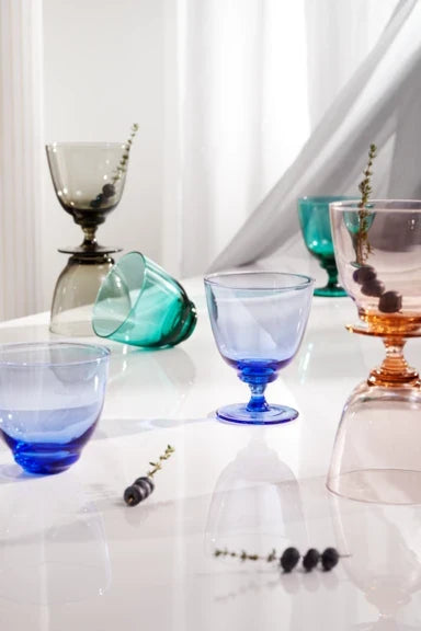 Holmegaard Flow Tumbler 35 cl in dark blue, clear, rose, amber, smoke, champagne and emerald green