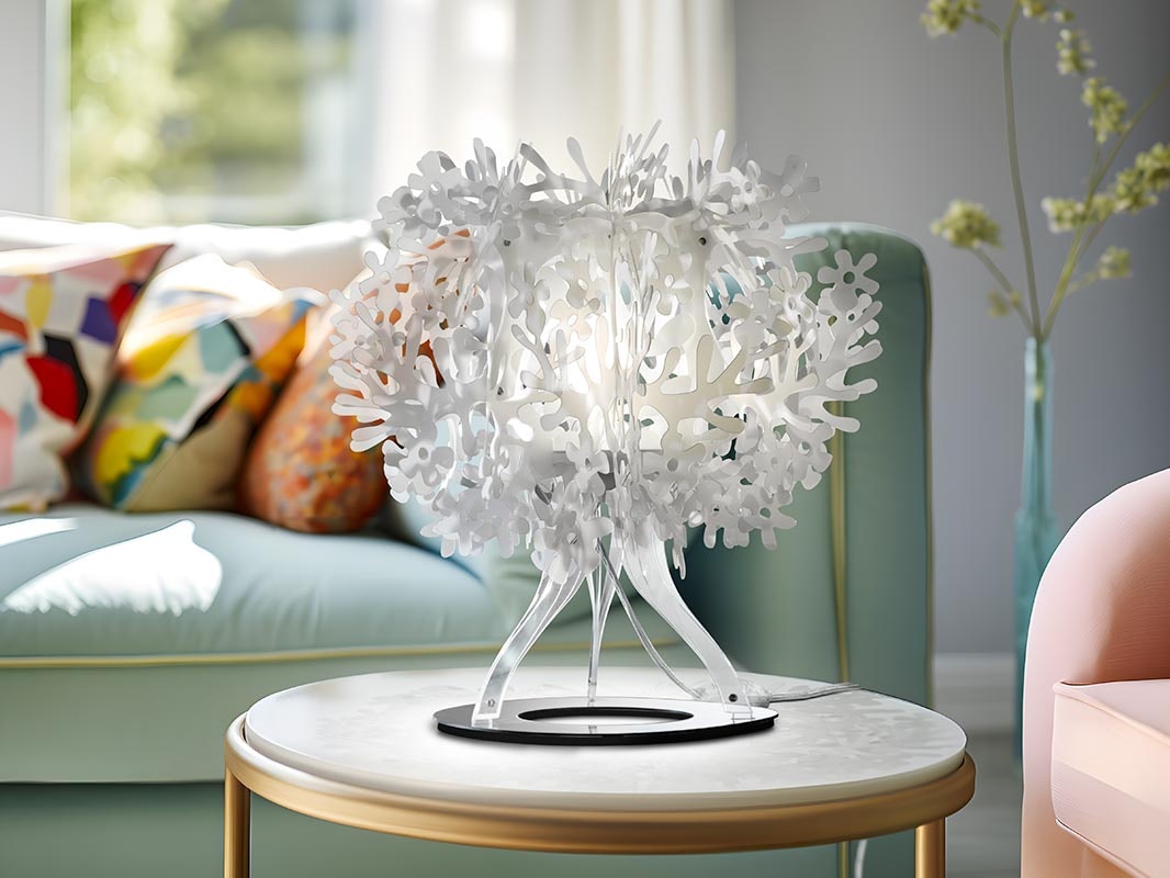 Slamp Fiorellina table lamp on a round side table in a living room